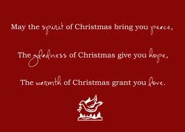 Festive Christmas message with warm wishes on a red background.